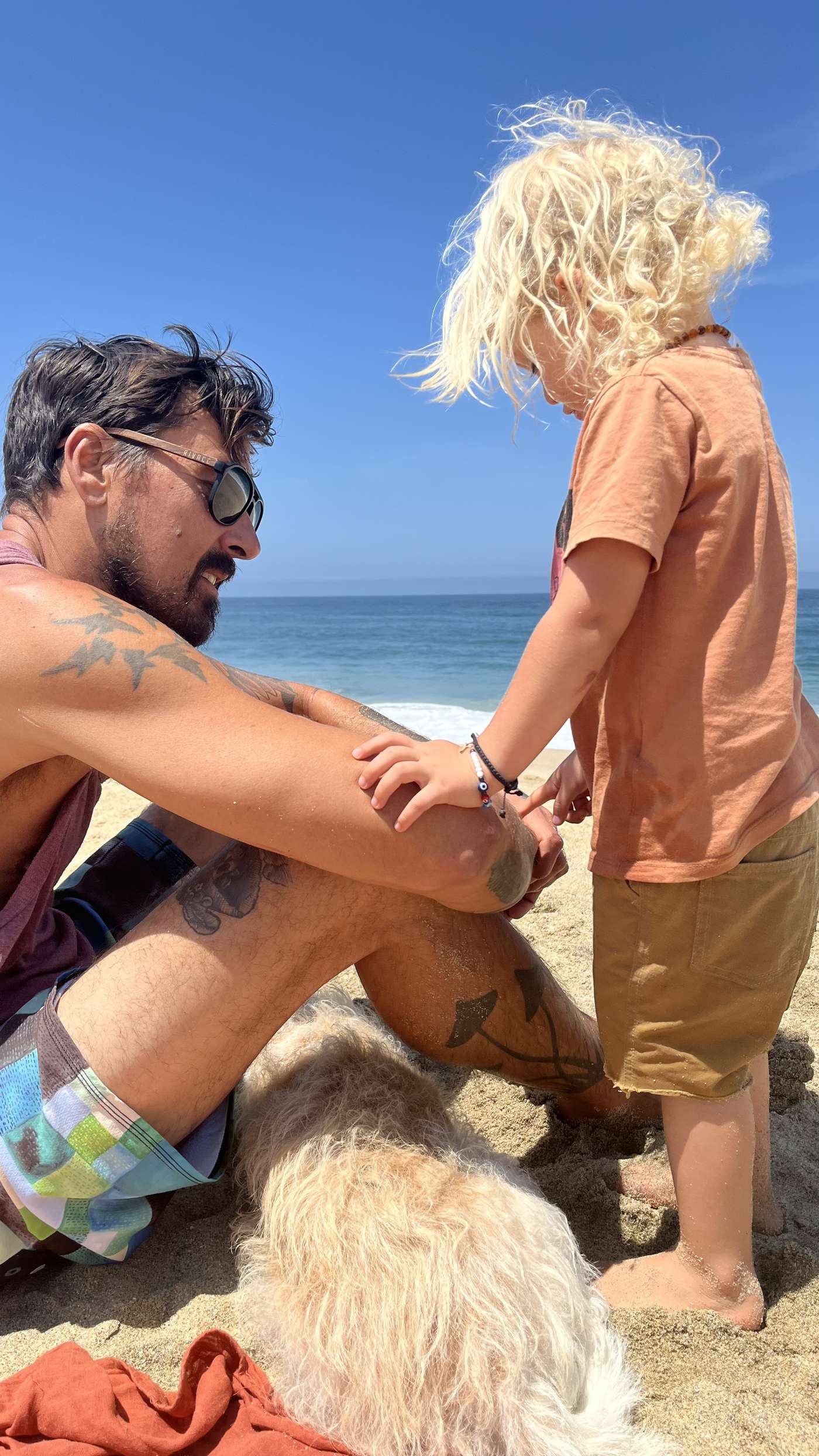 Tyler and Kai on the beach