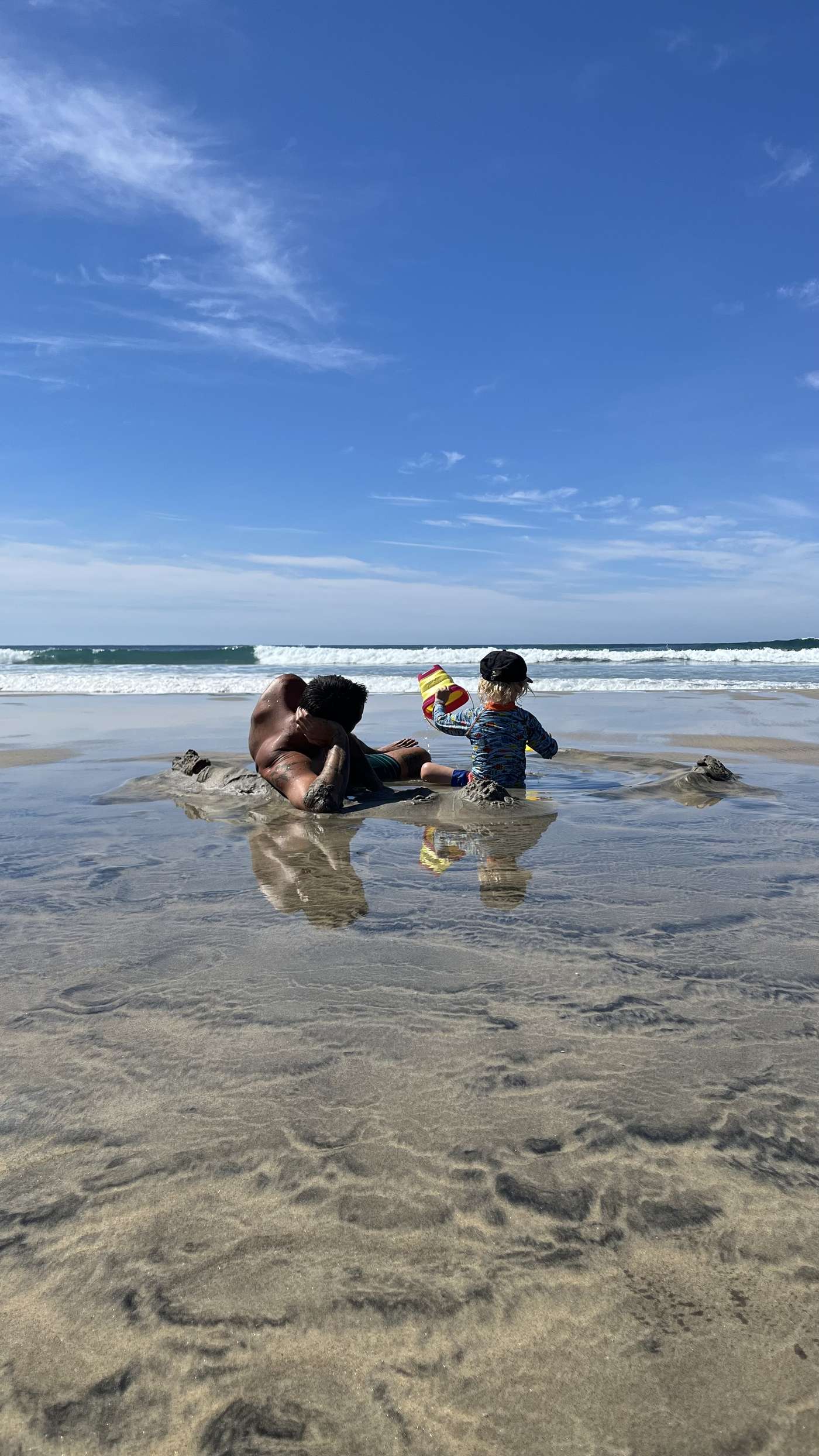 Tyler and Kai in the tide pool — the lifestyle these products support